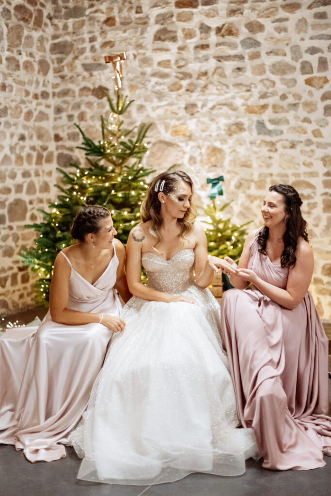 bride bridesmaids christmas new year christmas tree lights pink