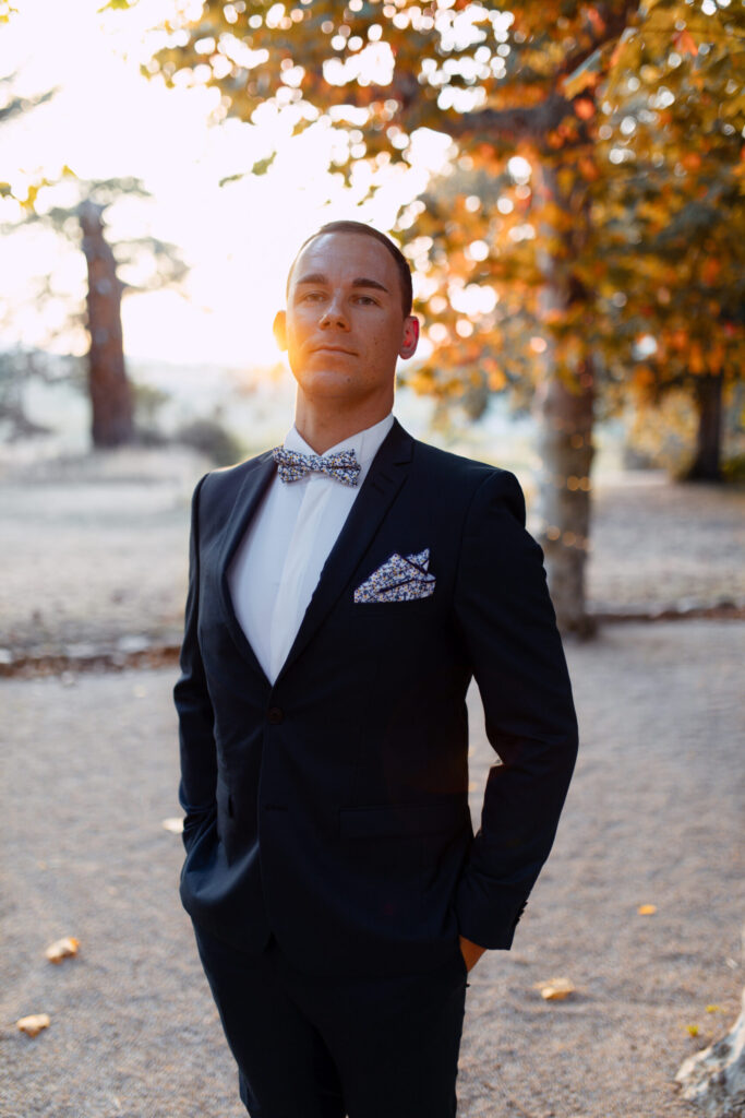 groom green wedding suit winter light snow new year's eve christmas wedding