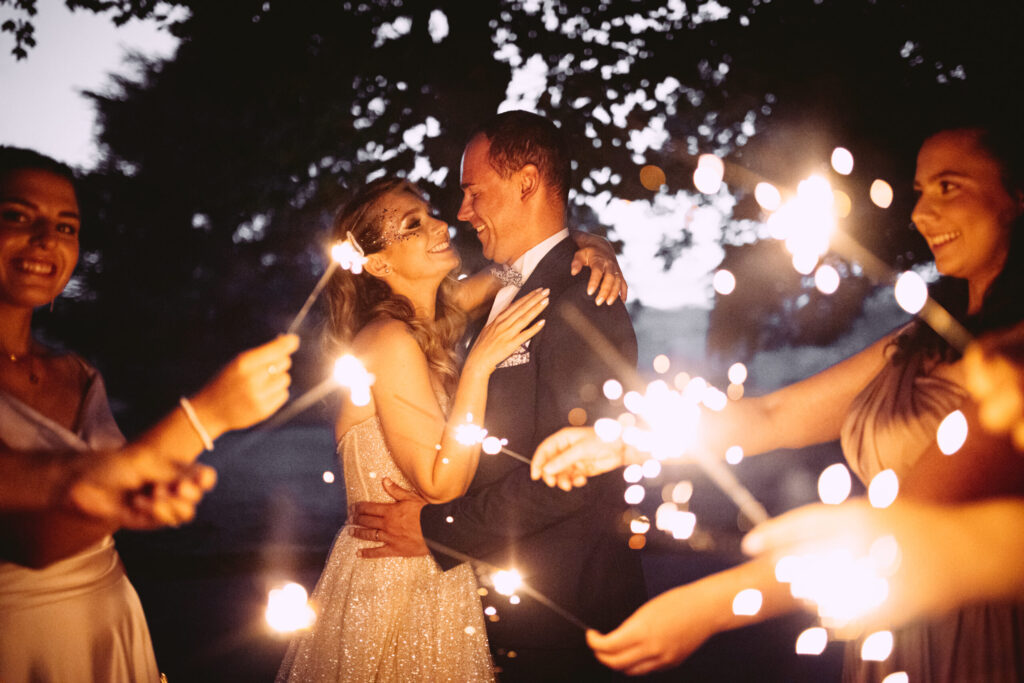 bride and groom fireworks new year couple bridesmaids glitters wedding